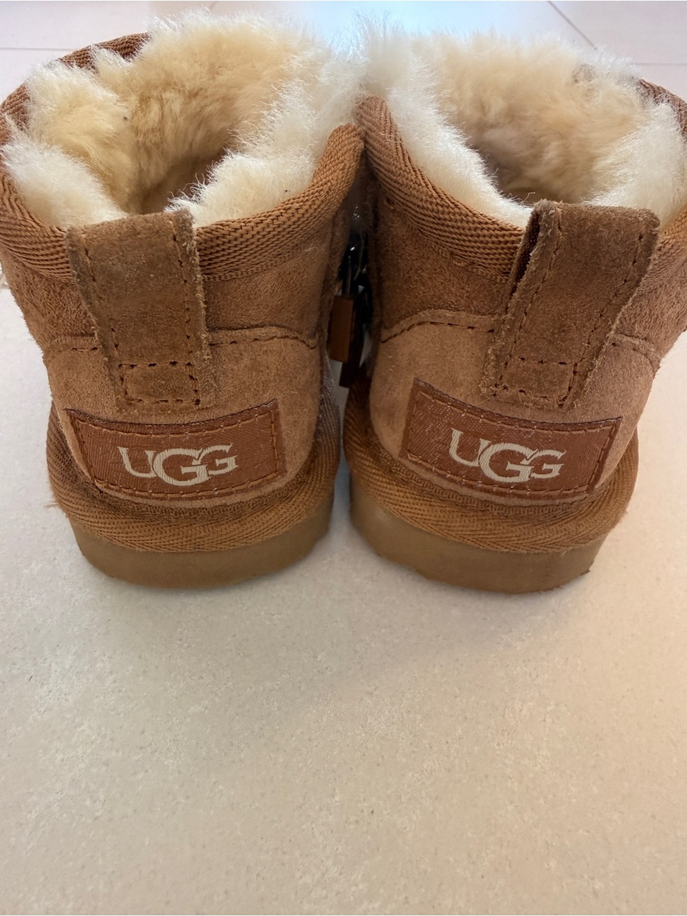 UGG Chestnut Mini Boot Sole View with Shearling Trim